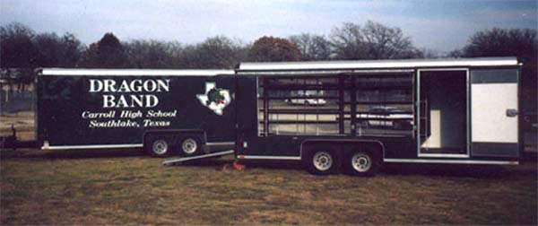 Two customized band trailers